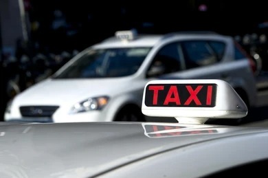 Taxi with a Driver Who Speaks English in Noida